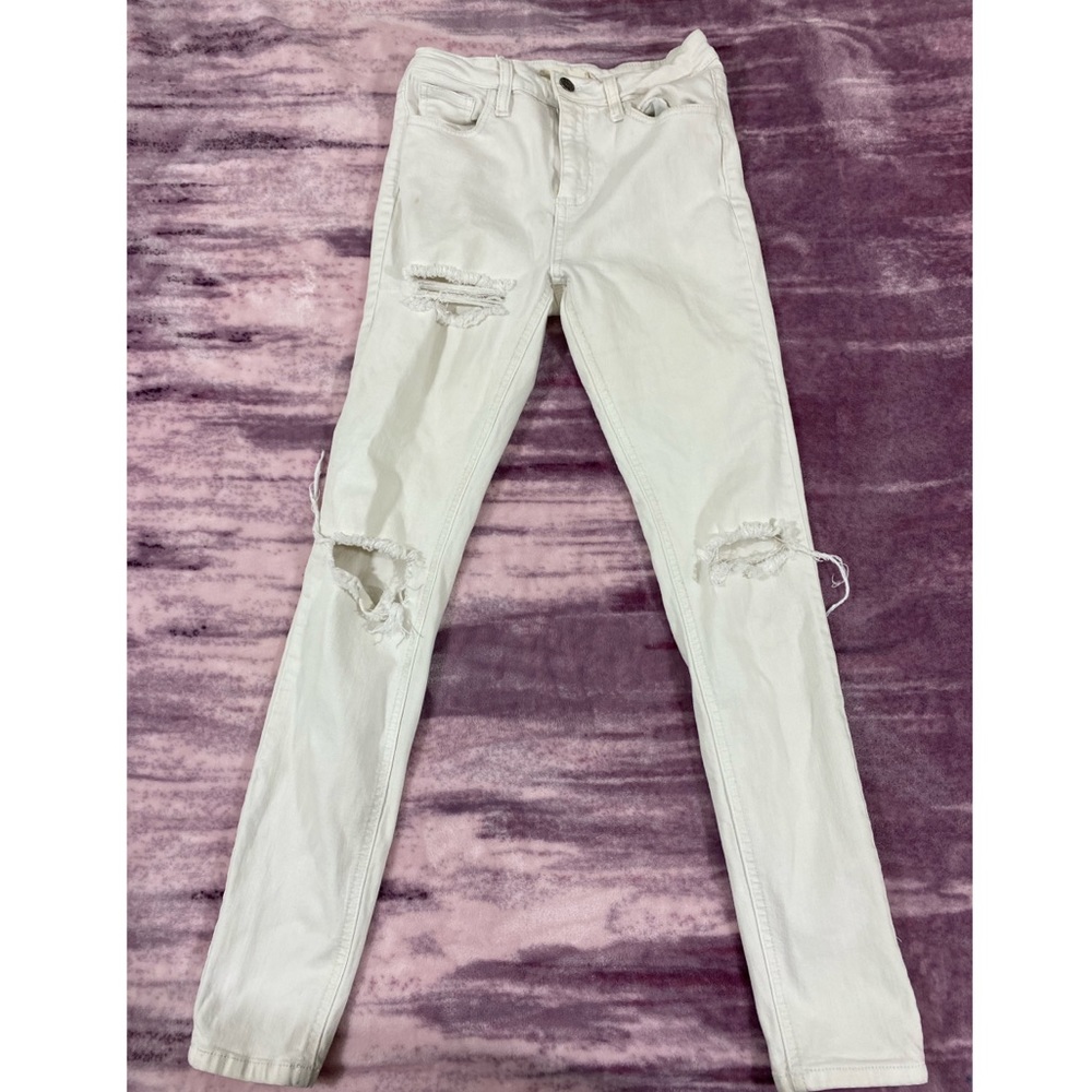 White ripped jeans